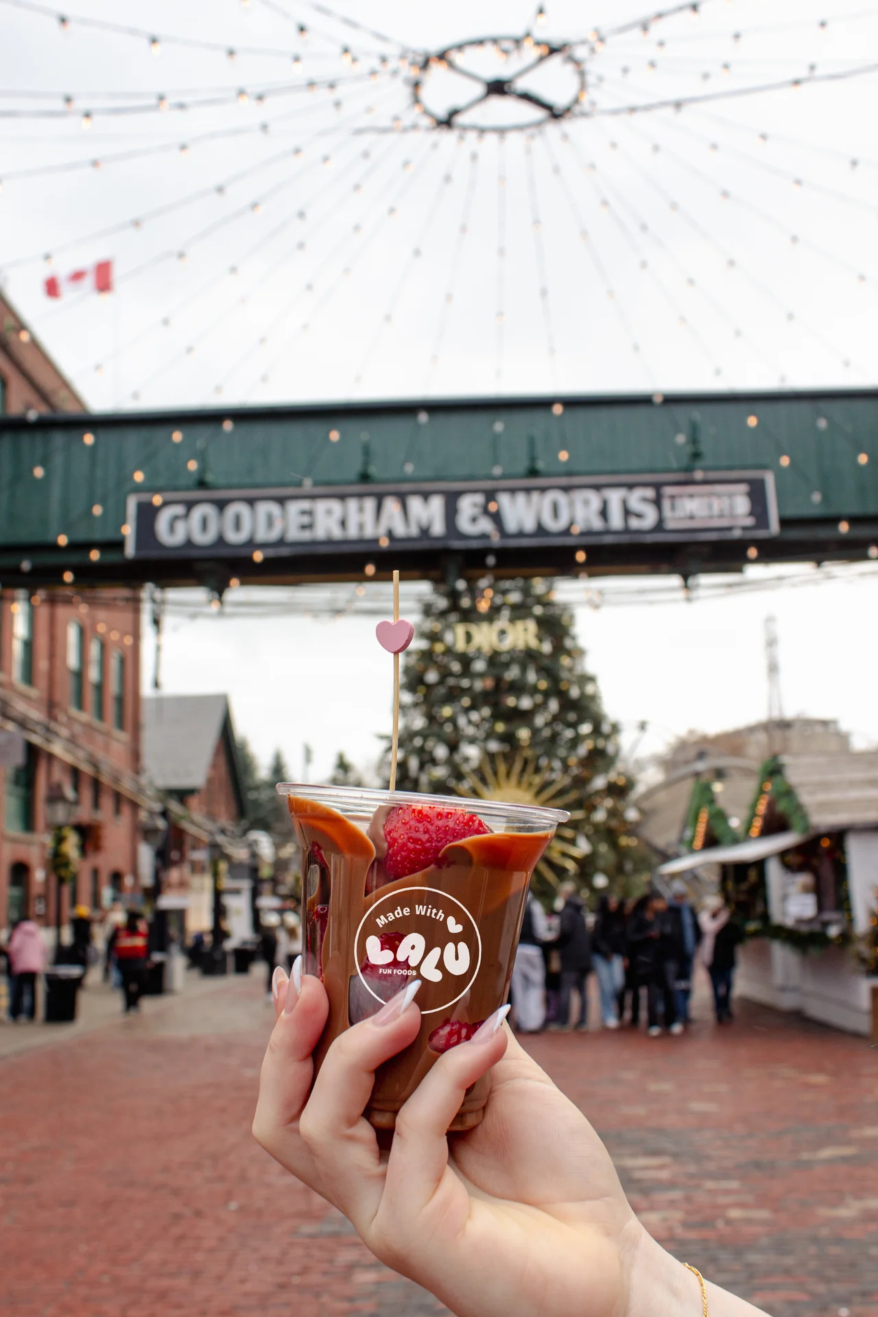 A branded Belgian Chocoberry station styled for the holidays - the same setup we run at the Distillery Winter Village