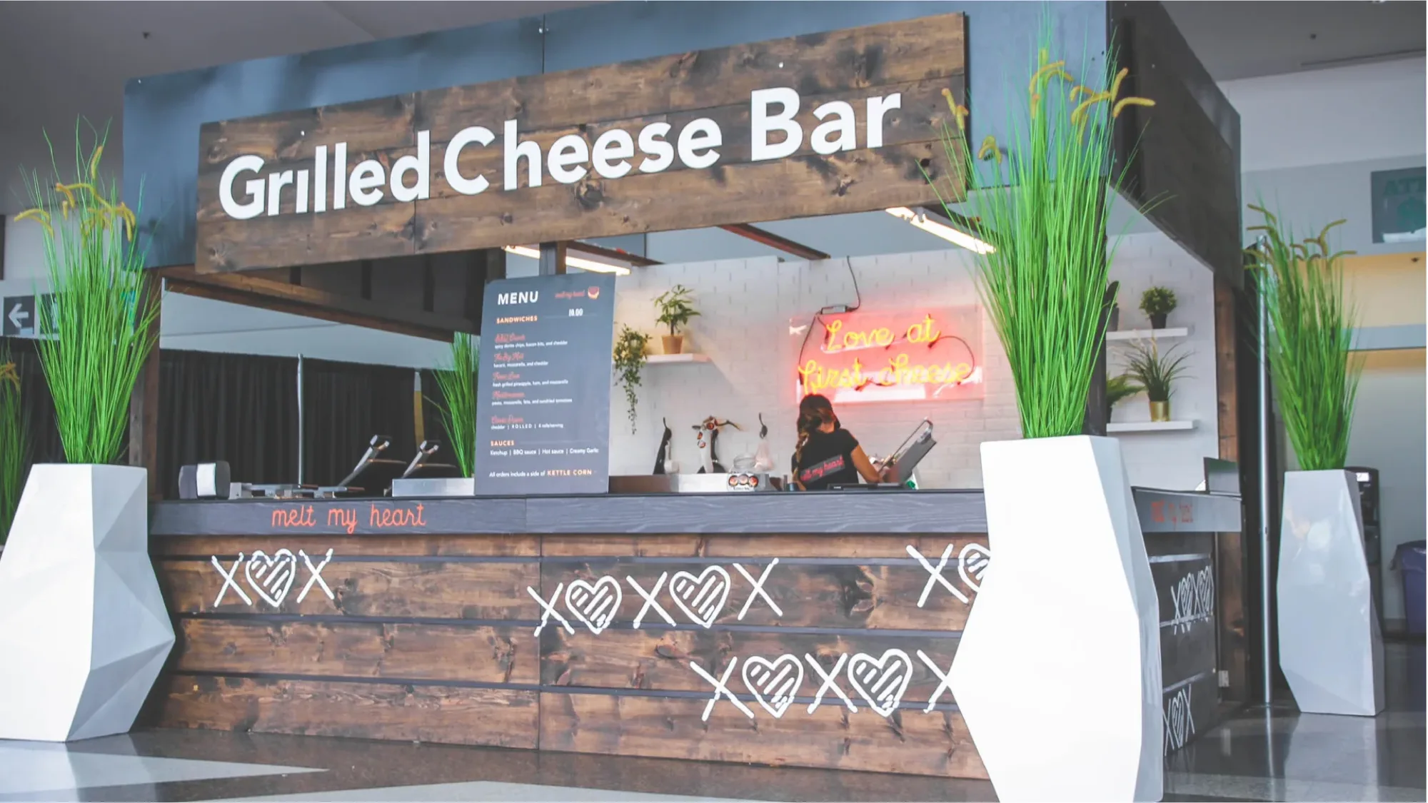 The Melt My Heart grilled cheese bar - sandwiches pressed to order and served hot, with the station branded to the event